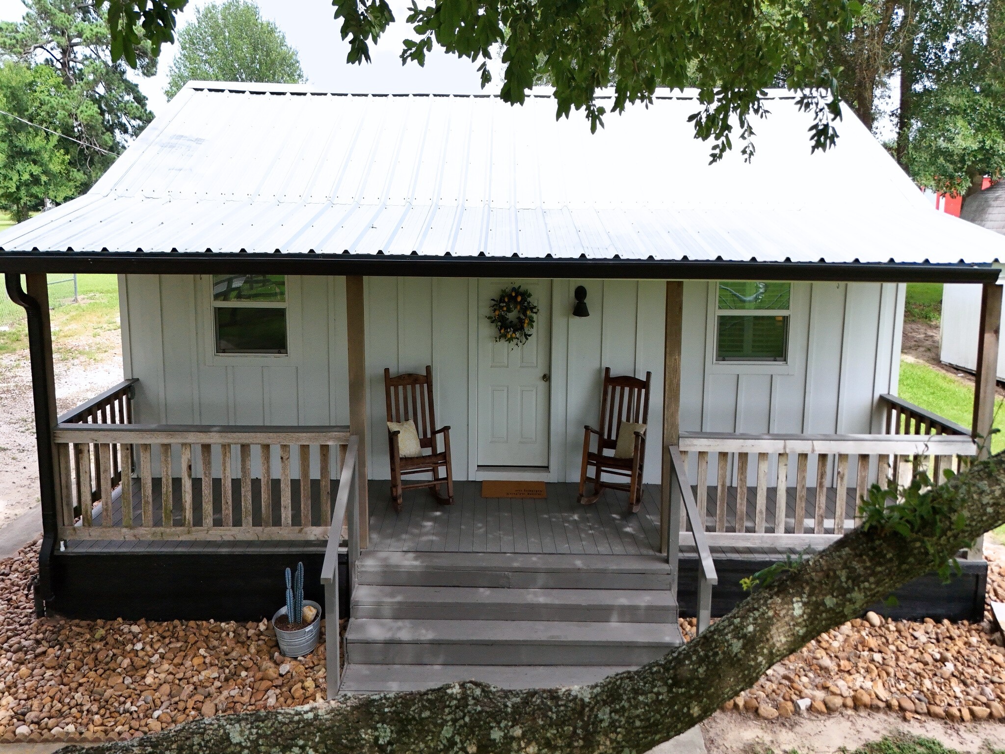409 Moffett Springs Road Huntsville, TX 77320 - Photo 11 of 25 a view of a deck with chair and table
