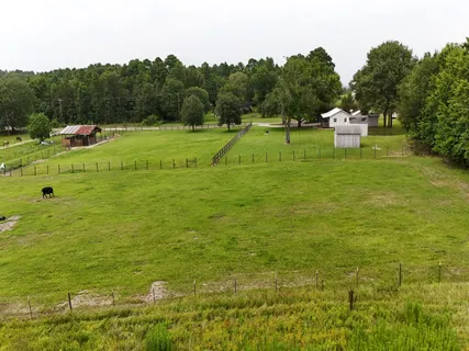 a view of a golf course with chairs