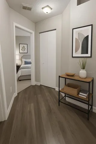 a bedroom with furniture and window