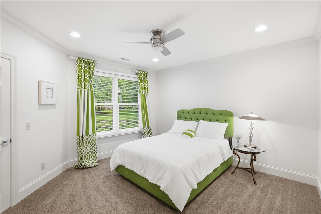 159 Rue Marseille Kettering, OH 45429 - Photo 36 of 52 This inviting bedroom features ample natural light and comfortable carpeting.