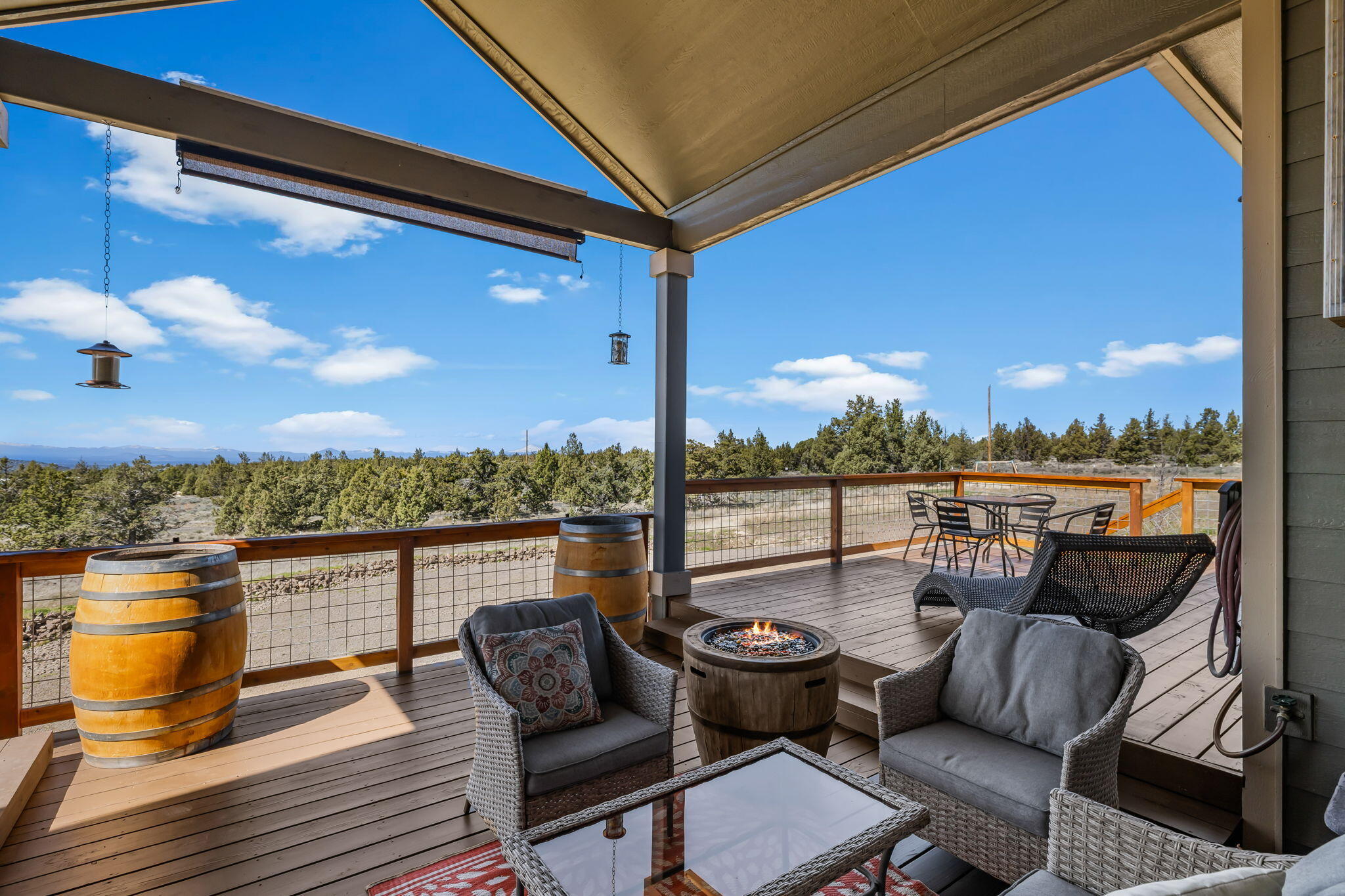 6040 Gravett Road Prineville, OR 97754 - Photo 42 of 77 a view of roof deck with seating space and a potted plant