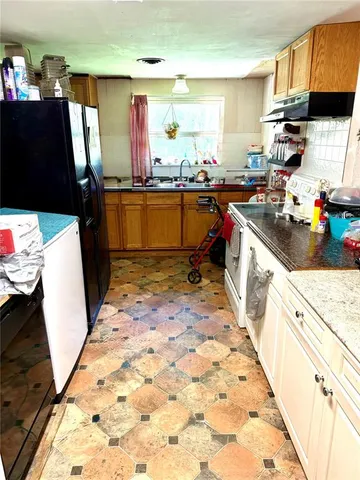 a room with musical instrument pool table and windows