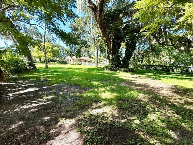 a view of swimming pool with yard