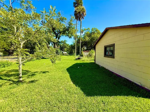 a view of a backyard with a garden
