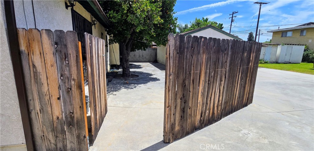 8730 6th Street Downey, CA 90241 - Photo 51 of 57 Back patio entrance from driveway