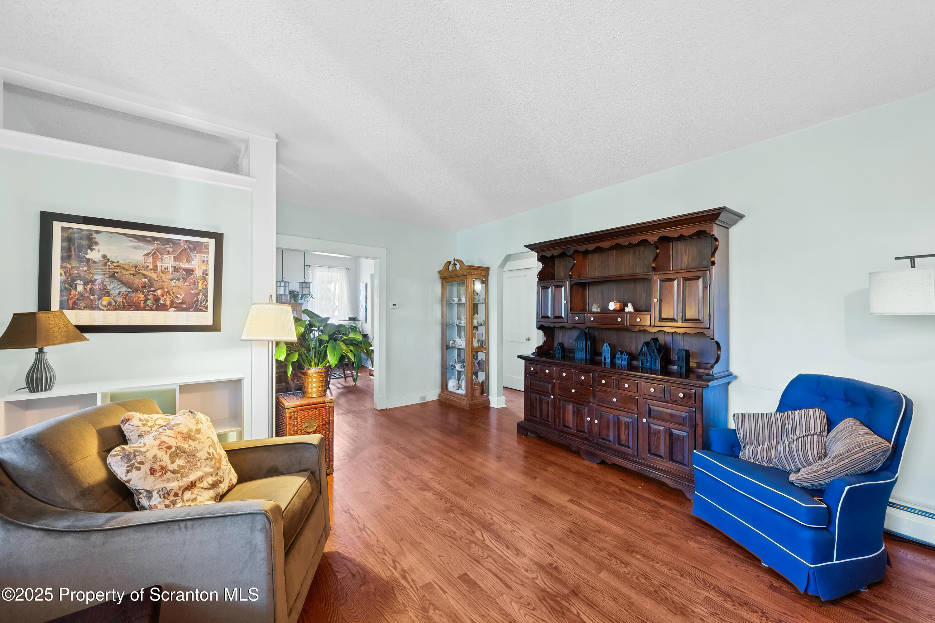 367 Carbondale Road Clarks Summit, PA 18411 - Photo 11 of 66 a living room with furniture and a flat screen tv