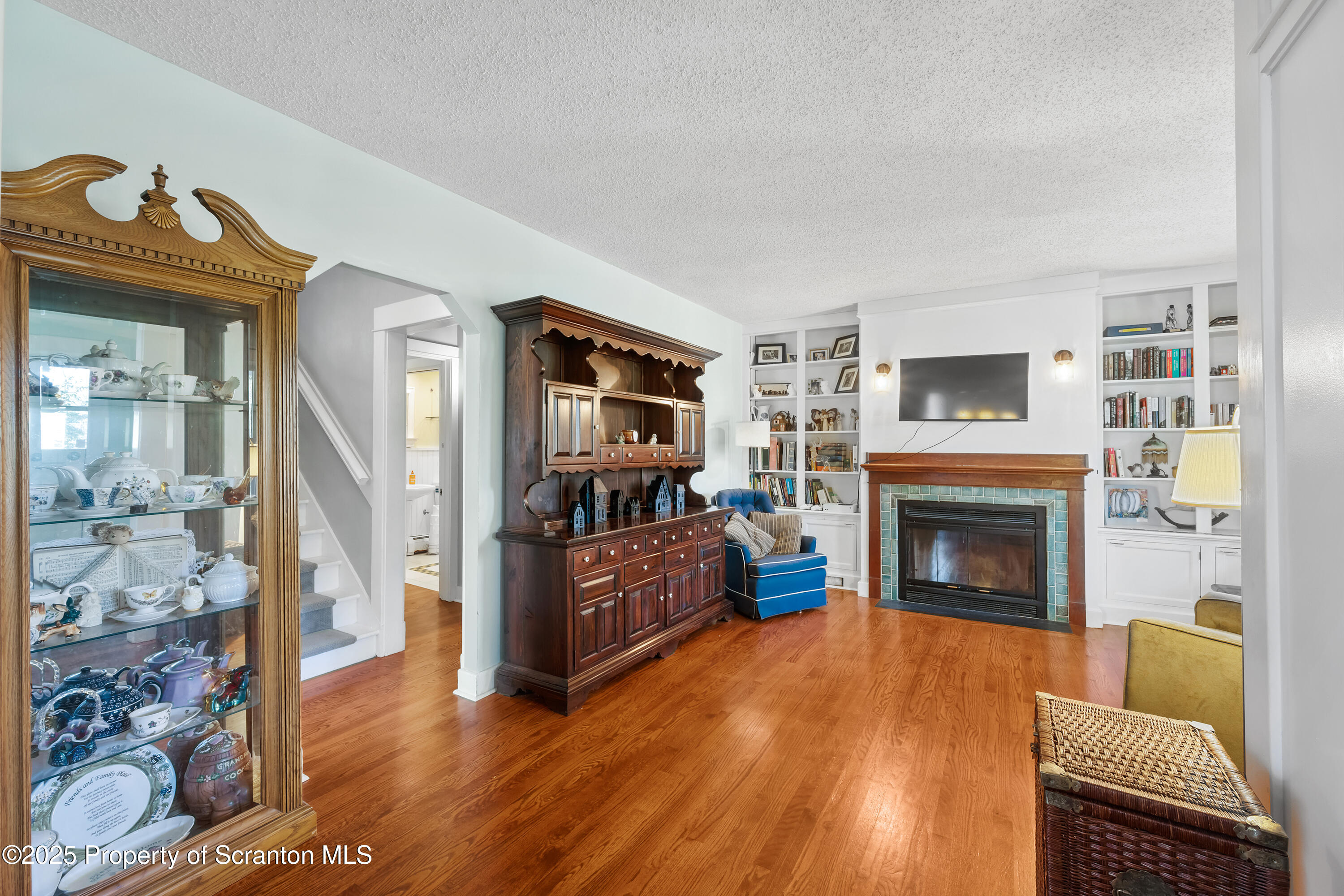 367 Carbondale Road Clarks Summit, PA 18411 - Photo 12 of 66 a living room with furniture and a fireplace