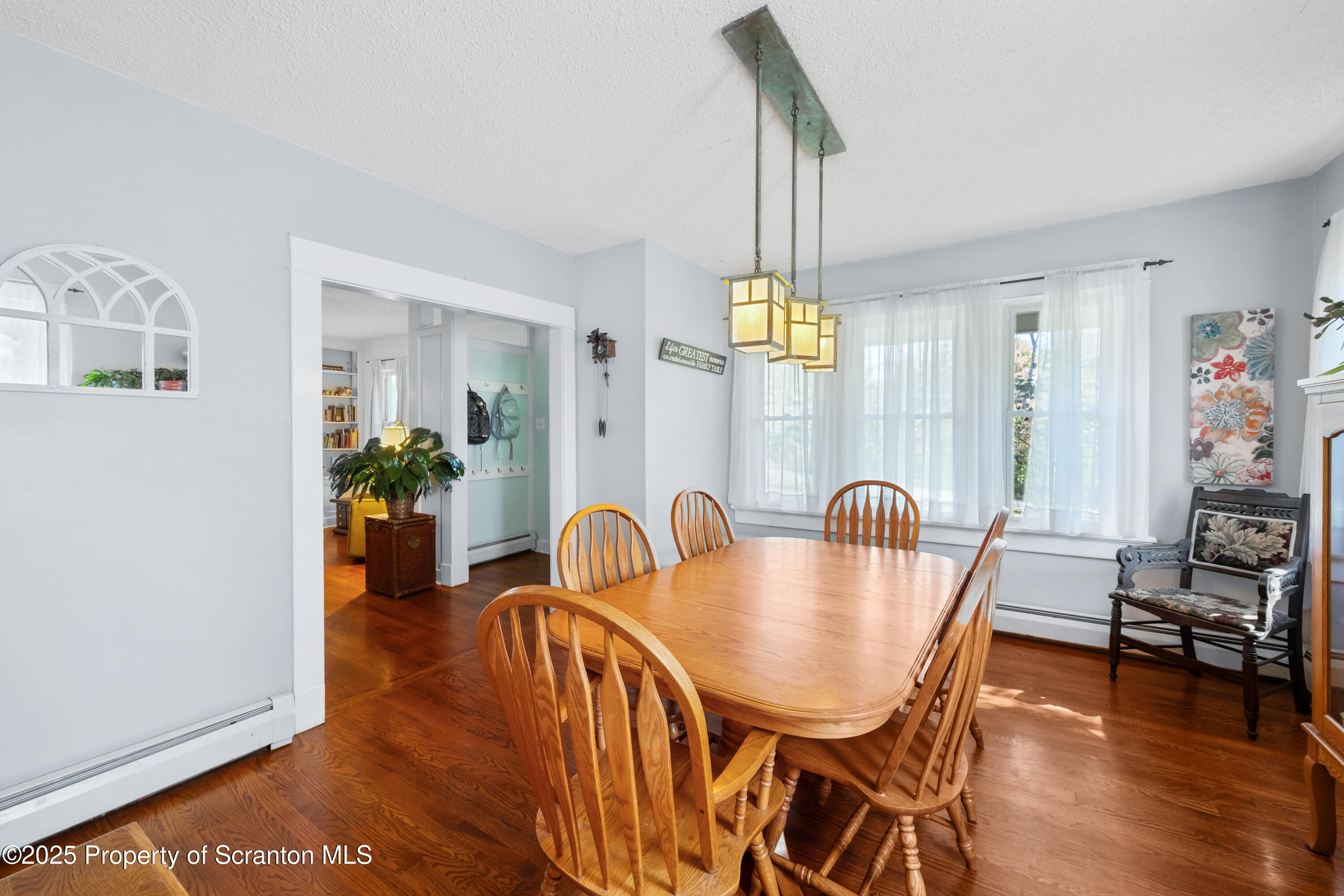 367 Carbondale Road Clarks Summit, PA 18411 - Photo 14 of 66 a dining room with furniture and wooden floor