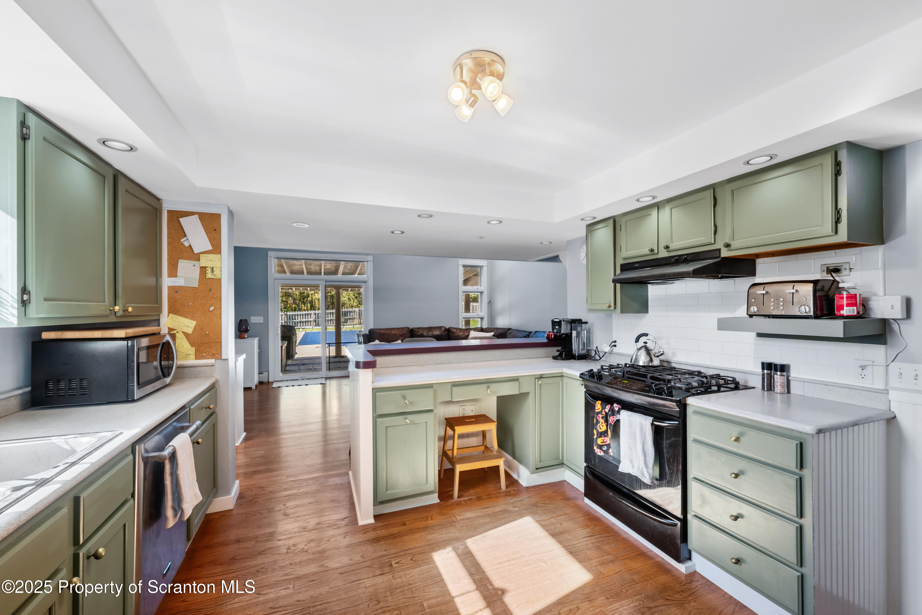 367 Carbondale Road Clarks Summit, PA 18411 - Photo 20 of 66 a kitchen with a stove and a microwave