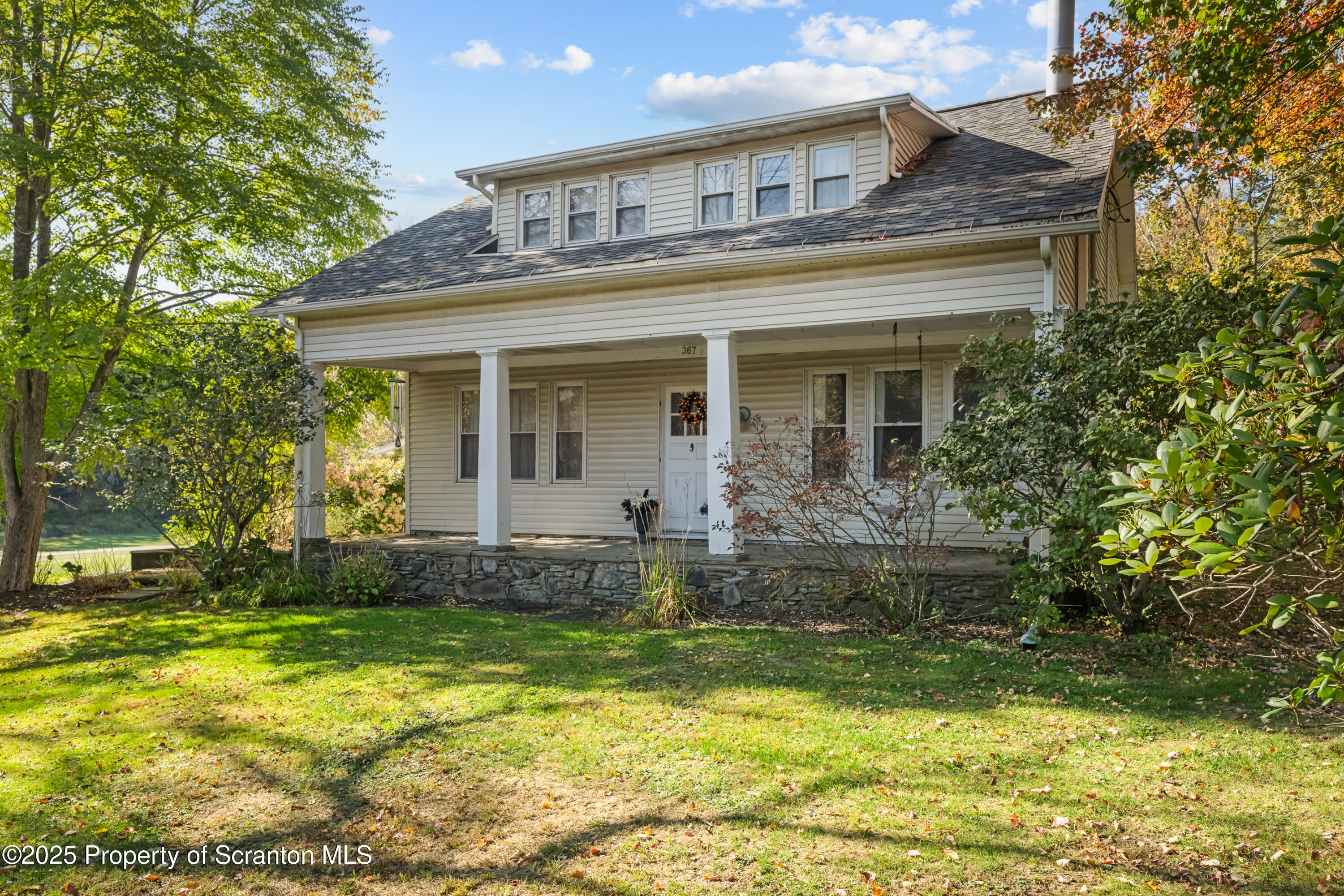 367 Carbondale Road Clarks Summit, PA 18411 - Photo 2 of 66 a front view of a house with garden