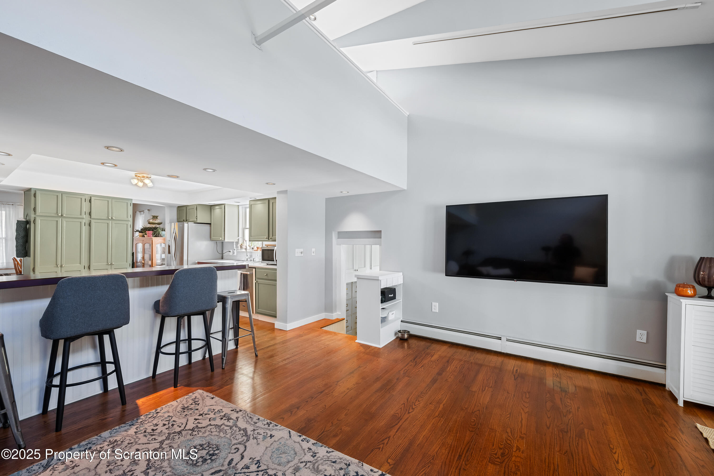 367 Carbondale Road Clarks Summit, PA 18411 - Photo 23 of 66 a living room with furniture and a flat screen tv