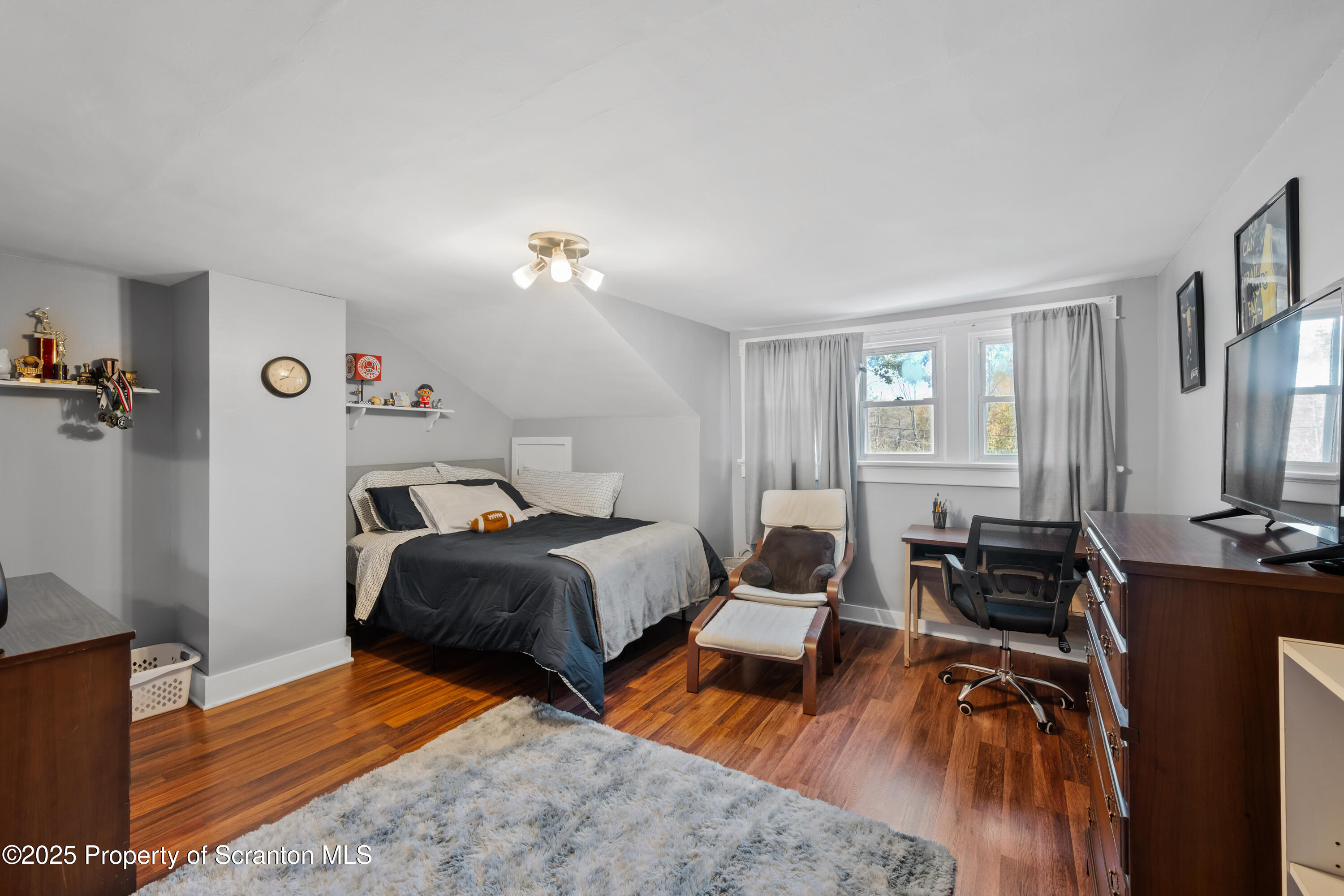 367 Carbondale Road Clarks Summit, PA 18411 - Photo 28 of 66 a bedroom with furniture and wooden floor