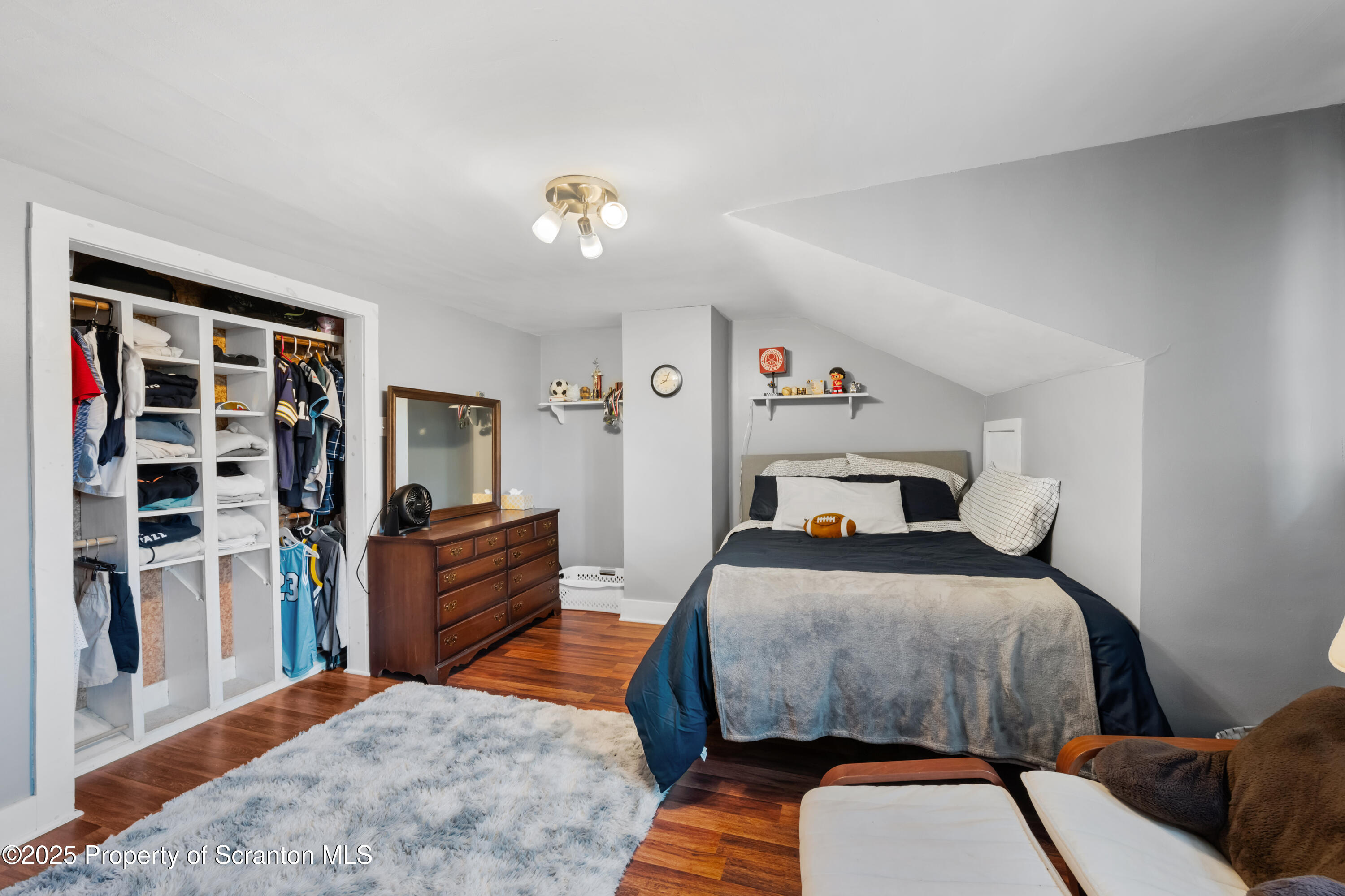 367 Carbondale Road Clarks Summit, PA 18411 - Photo 29 of 66 a bedroom with a bed and wooden floor