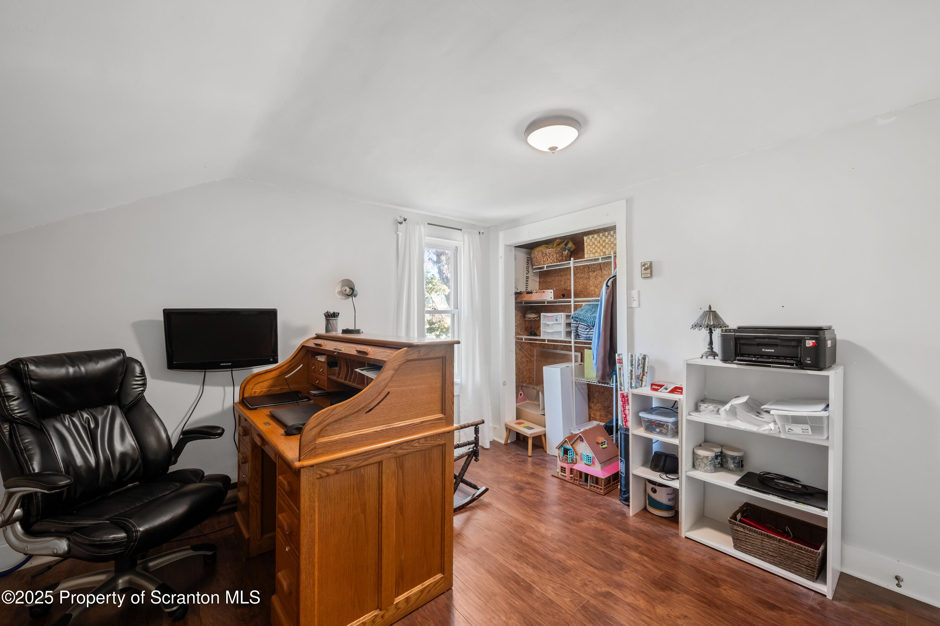 367 Carbondale Road Clarks Summit, PA 18411 - Photo 36 of 66 a bedroom with furniture and a book shelf