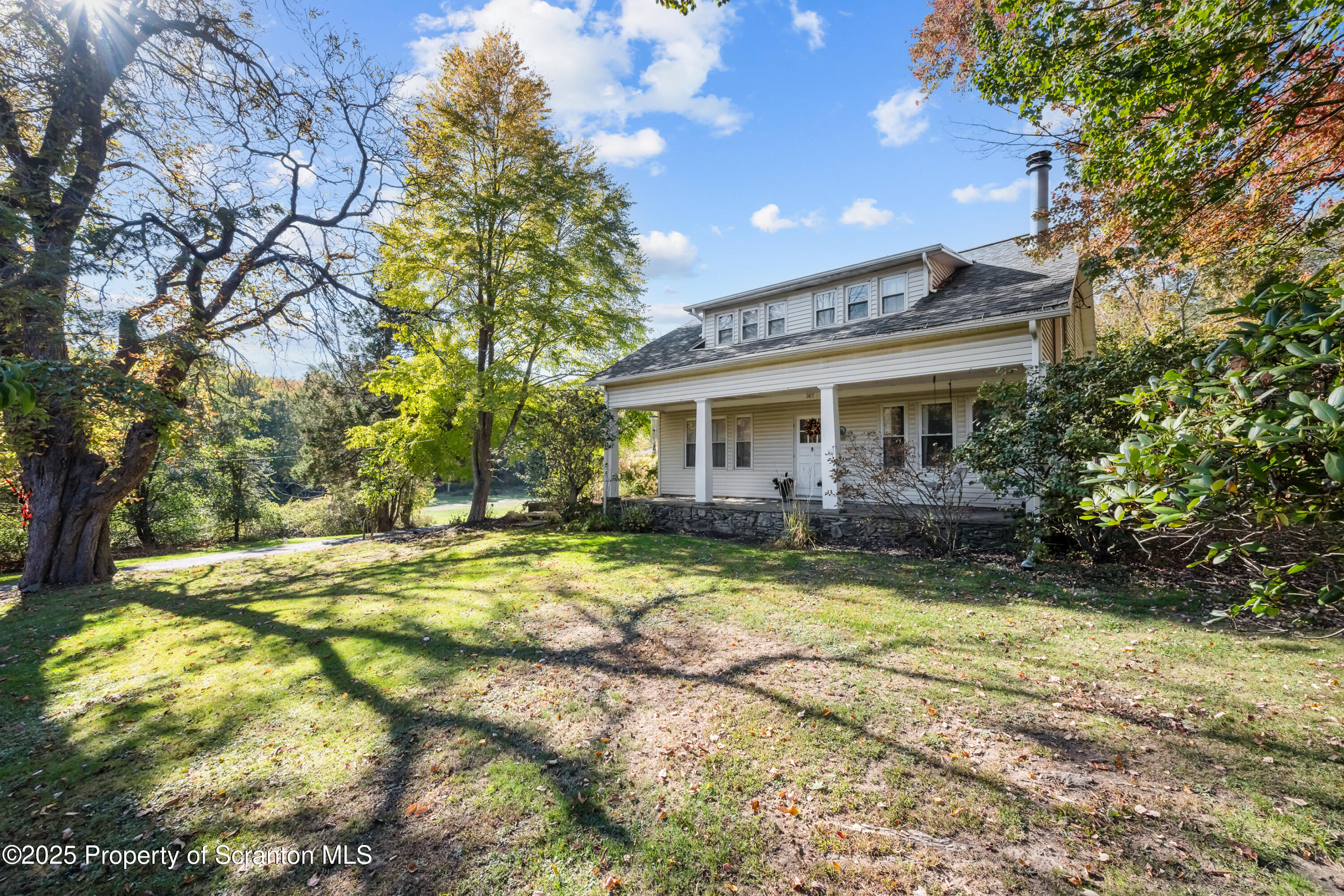 367 Carbondale Road Clarks Summit, PA 18411 - Photo 4 of 66 a view of house with yard and sitting area
