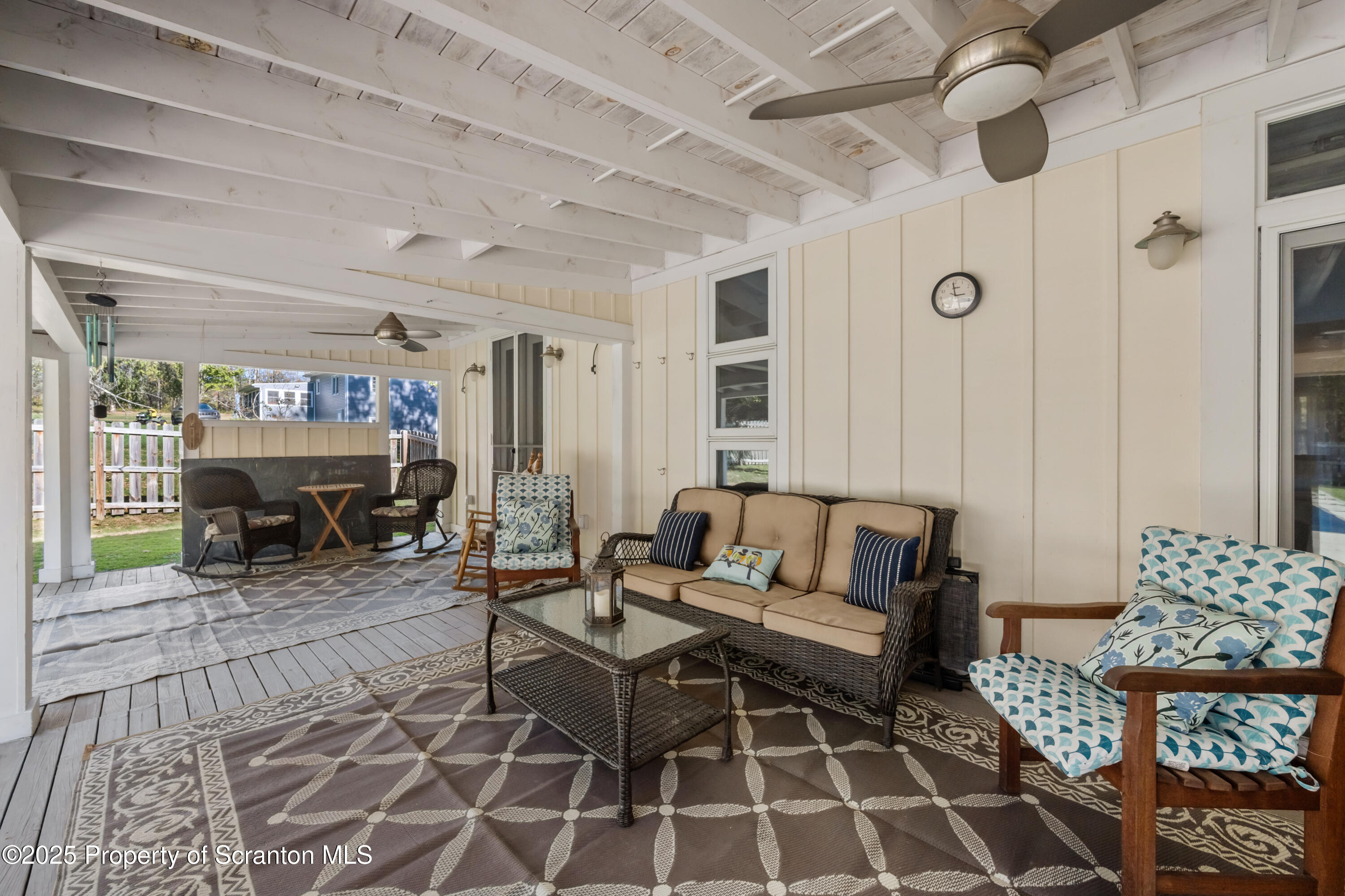367 Carbondale Road Clarks Summit, PA 18411 - Photo 42 of 66 a living room with furniture a fireplace and a table