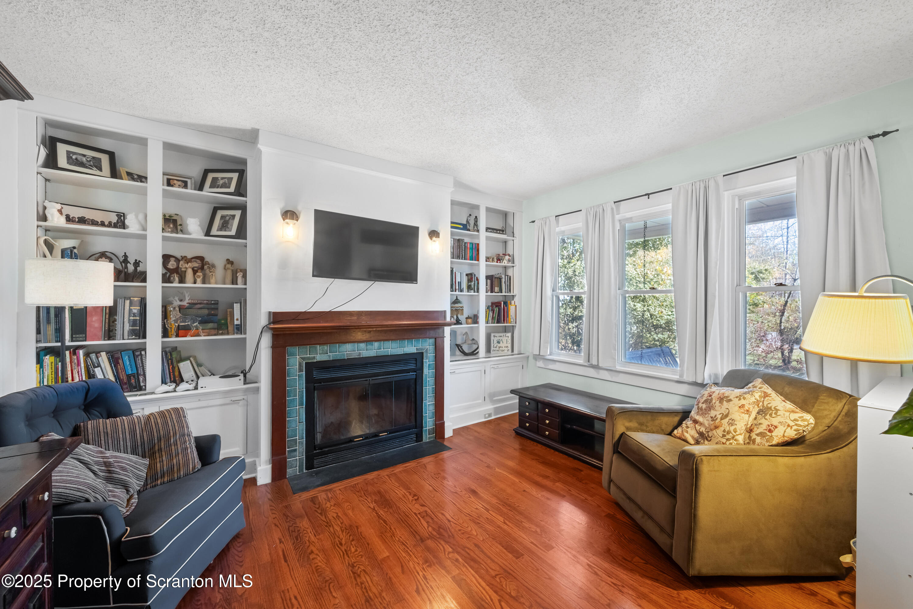 367 Carbondale Road Clarks Summit, PA 18411 - Photo 10 of 66 a living room with furniture and a fireplace