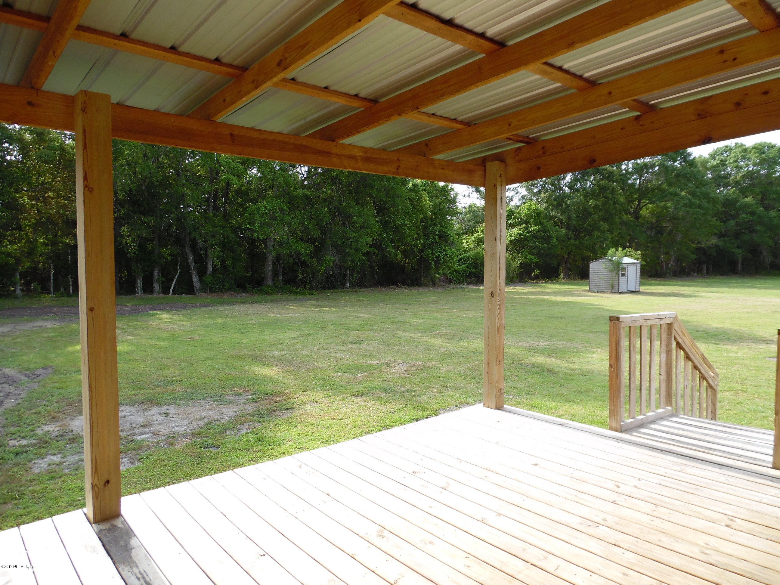 7103 Fred Perry Road Glen St. Mary, FL 32040 - Photo 18 of 28 PORCH OVERLOOKS PRIVATE BACK YARD