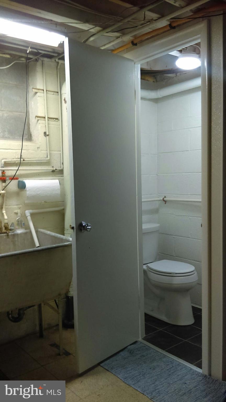 5659 Chelwynd Road Baltimore, MD 21227 - Photo 24 of 30 Basement quarter bathroom