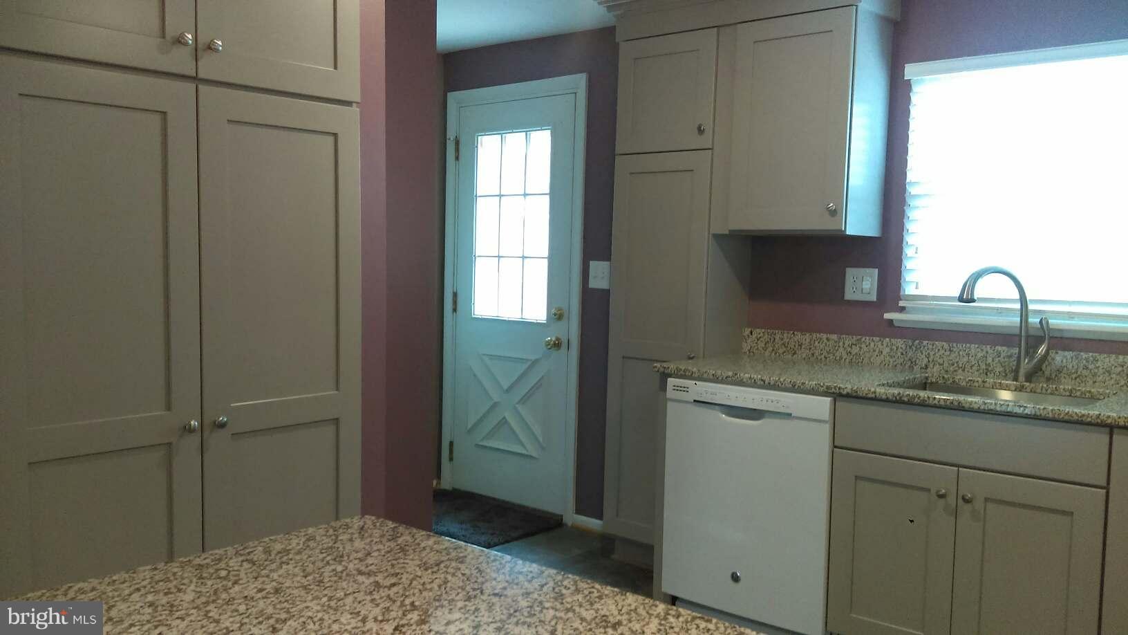 5659 Chelwynd Road Baltimore, MD 21227 - Photo 25 of 30 Kitchen back door