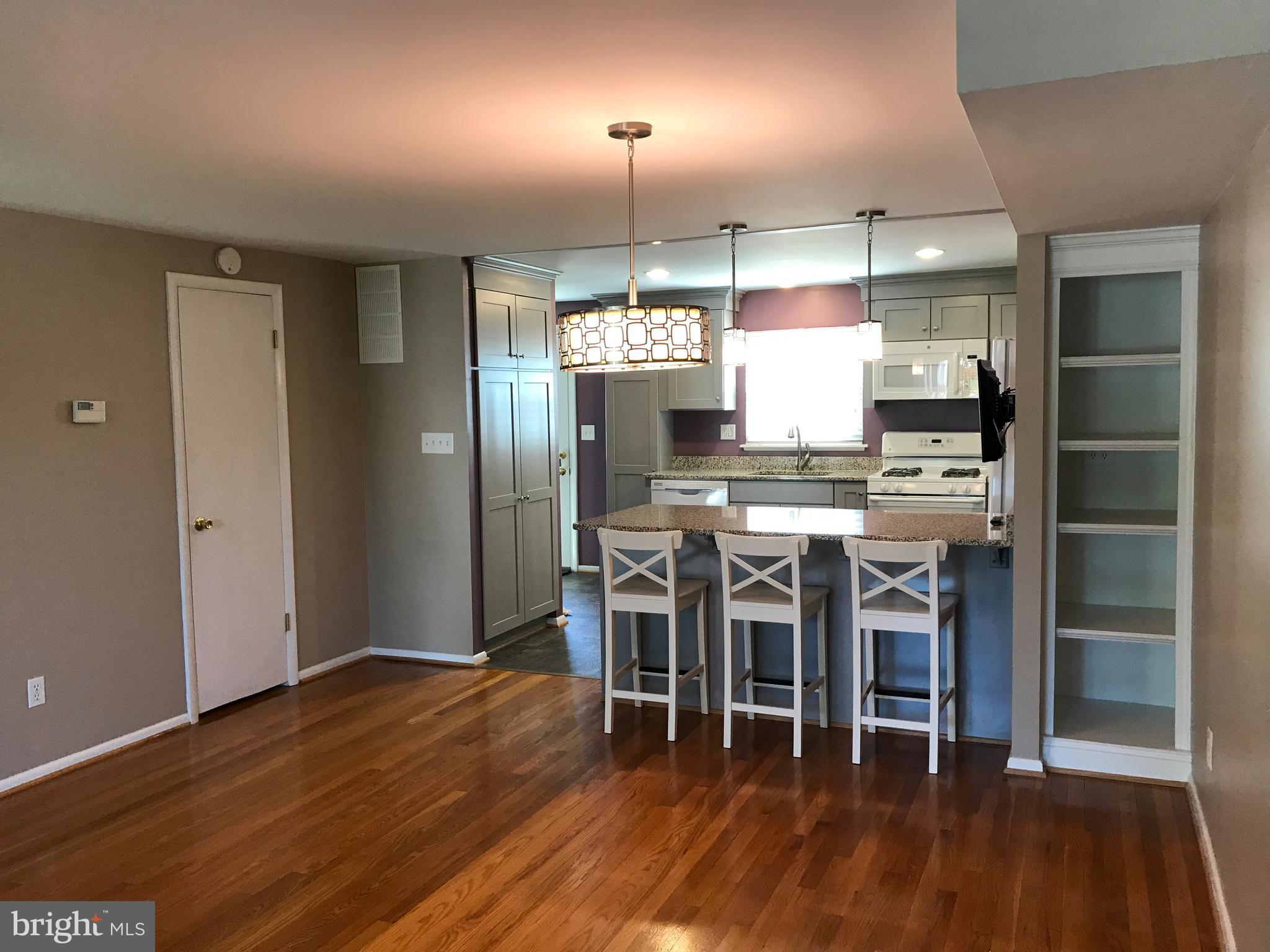 5659 Chelwynd Road Baltimore, MD 21227 - Photo 5 of 30 Dining Room, Hardwood Floors, Custom Built-Ins