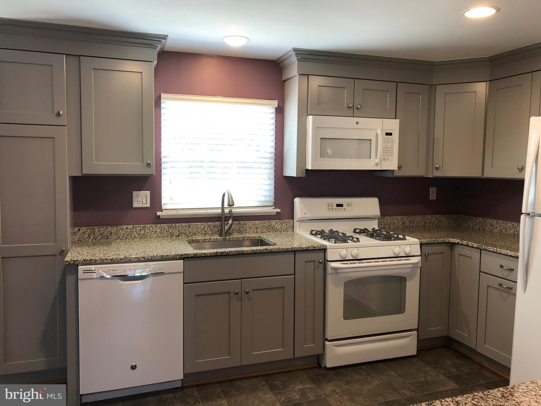 5659 Chelwynd Road Baltimore, MD 21227 - Photo 9 of 30 Built-In Microwave, Dishwasher and Gas Stove