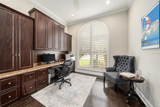 a large kitchen with stainless steel appliances granite countertop a stove and a sink