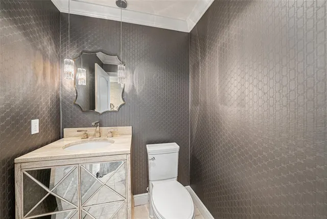 a spacious bathroom with a double vanity sink a mirror and a bathtub