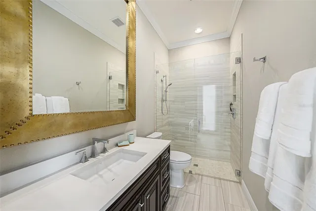 a bathroom with a sink a toilet and a tub