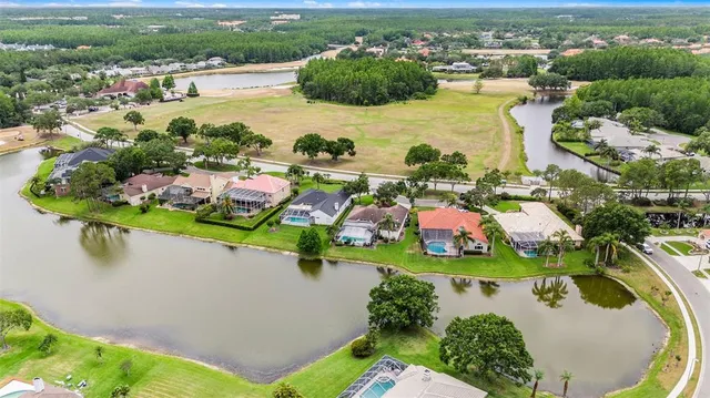 a view of a houses with a yard