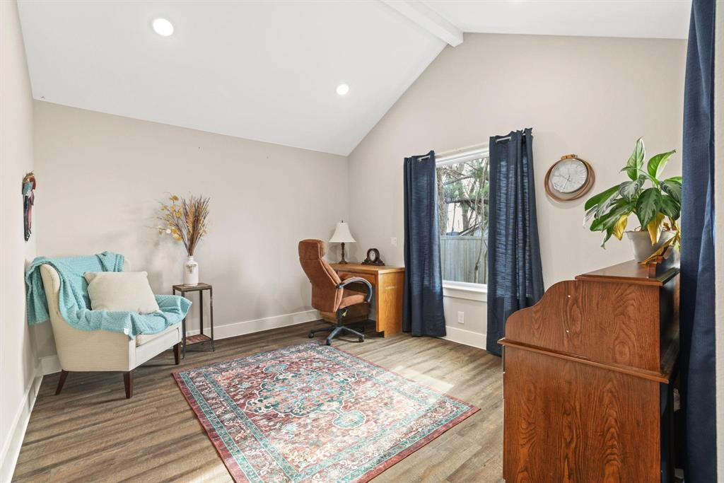 114 West Morton Street Denison, TX 75021 - Photo 19 of 21 a workspace with furniture and a rug