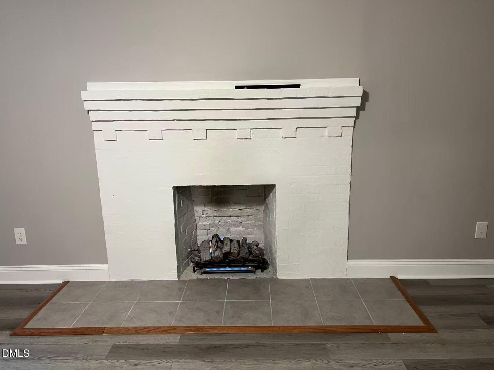 409 Rockingham Street Carthage, NC 28327 - Photo 19 of 56 a close up view of a fireplace