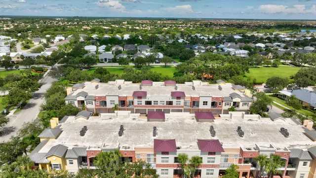 a view of a dinning table and chairs in the patio