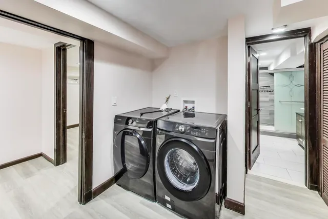 a kitchen with a stove and a refrigerator