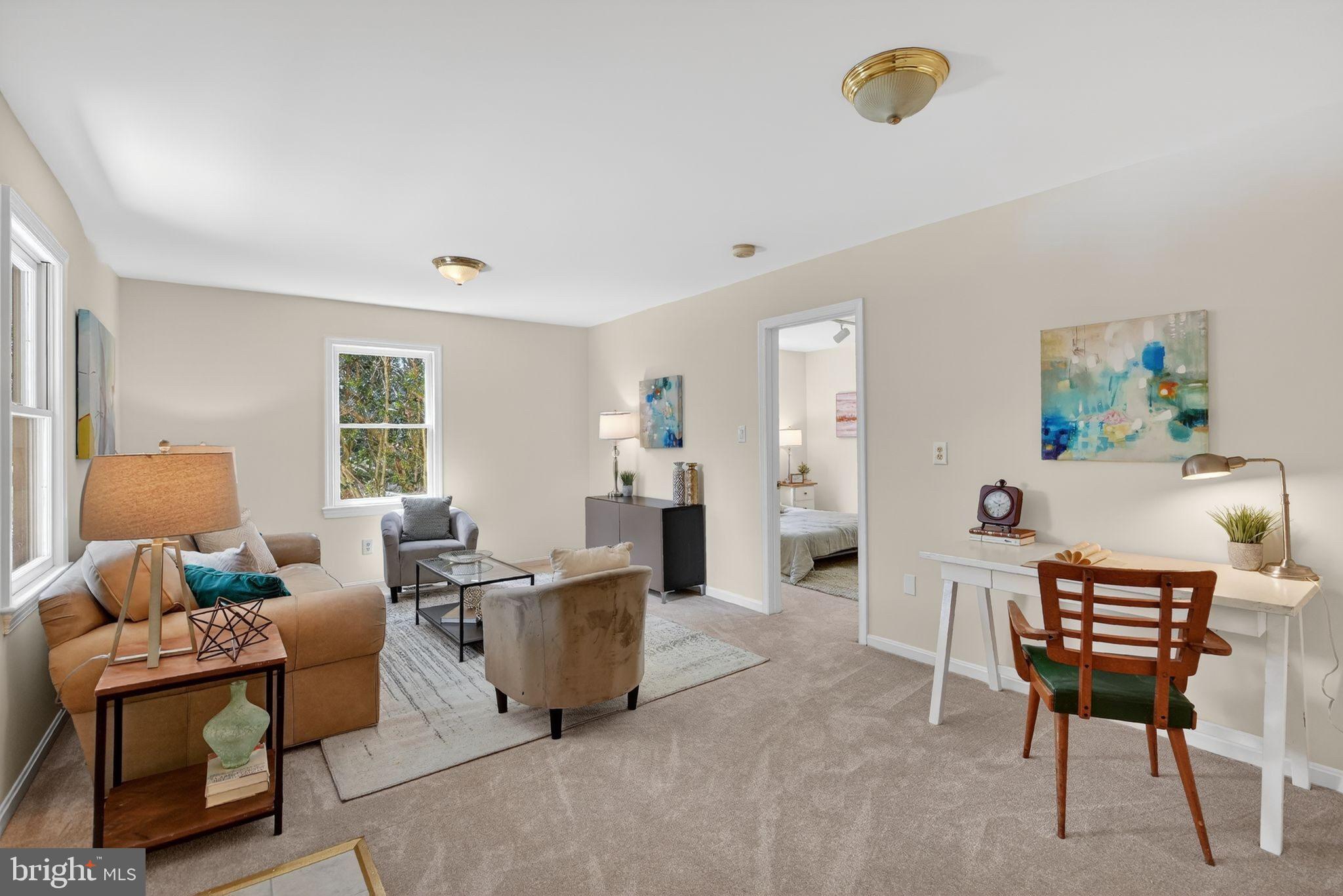 13821 Esworthy Road Darnestown, MD 20874 - Photo 29 of 98 a living room with furniture and a window