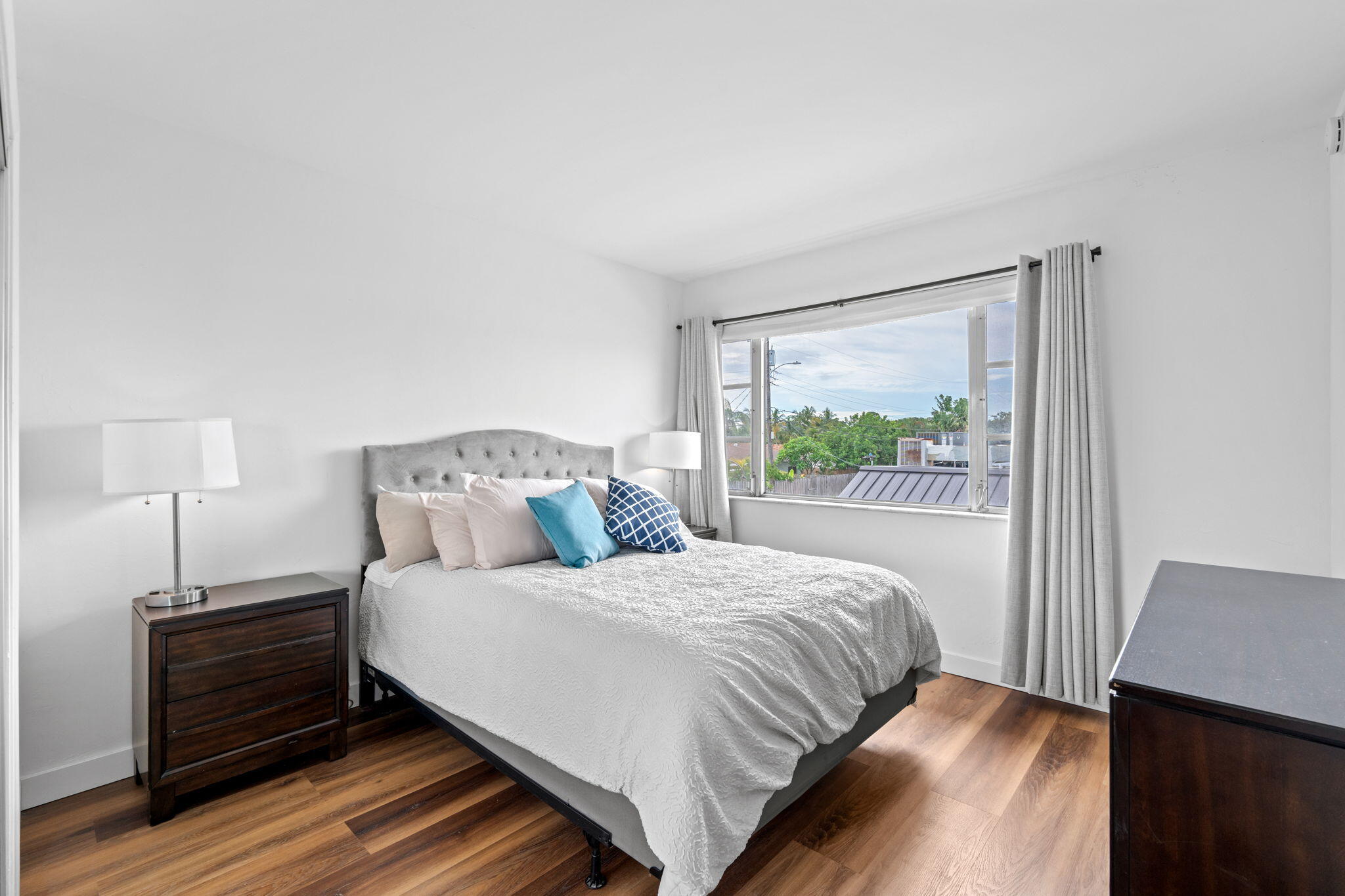 418 South Cypress Road, Unit 128 Pompano Beach, FL 33060 - Photo 21 of 49 a bedroom with a bed and a window