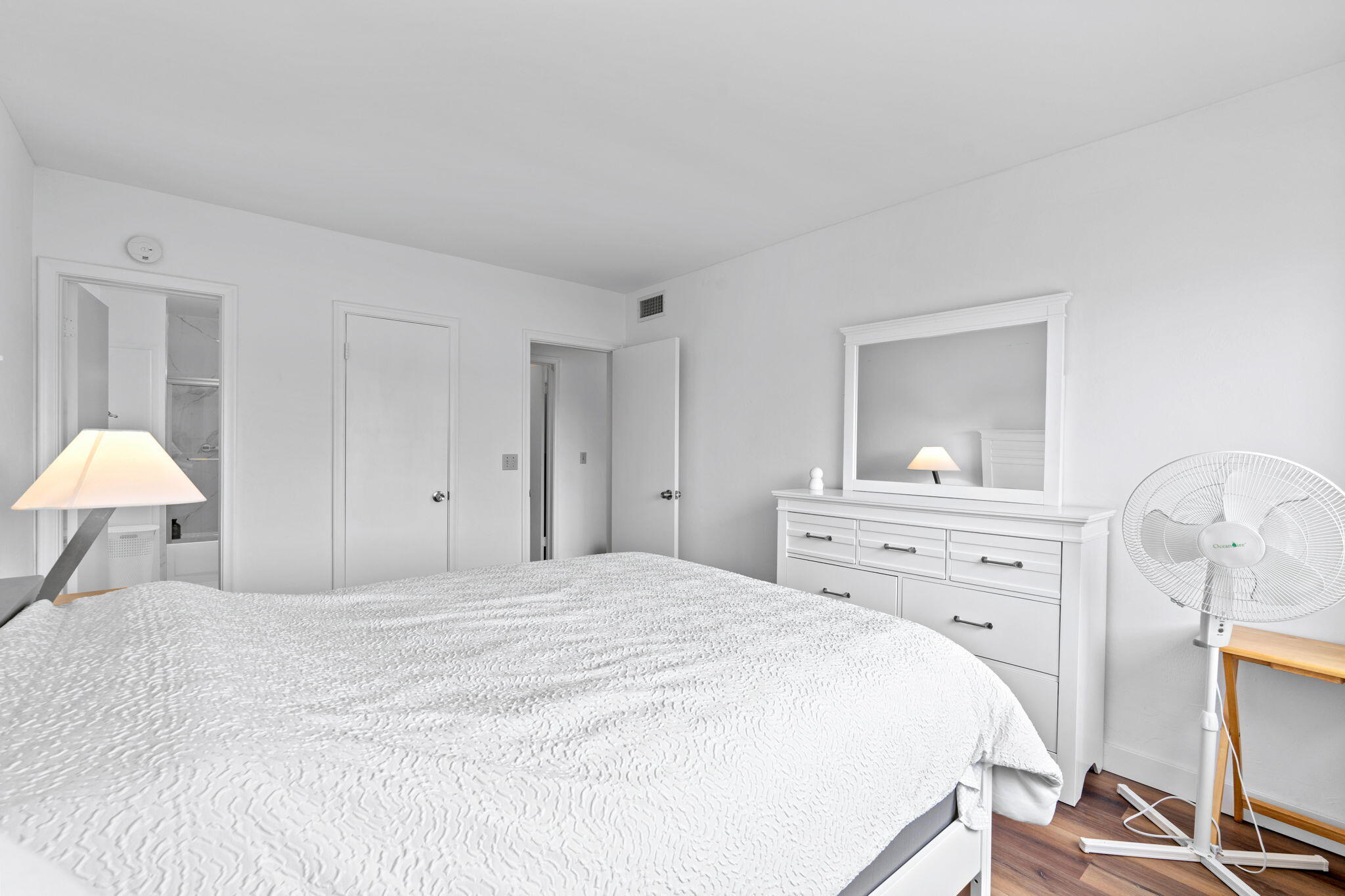 418 South Cypress Road, Unit 128 Pompano Beach, FL 33060 - Photo 26 of 49 a bedroom with a bed and a dresser