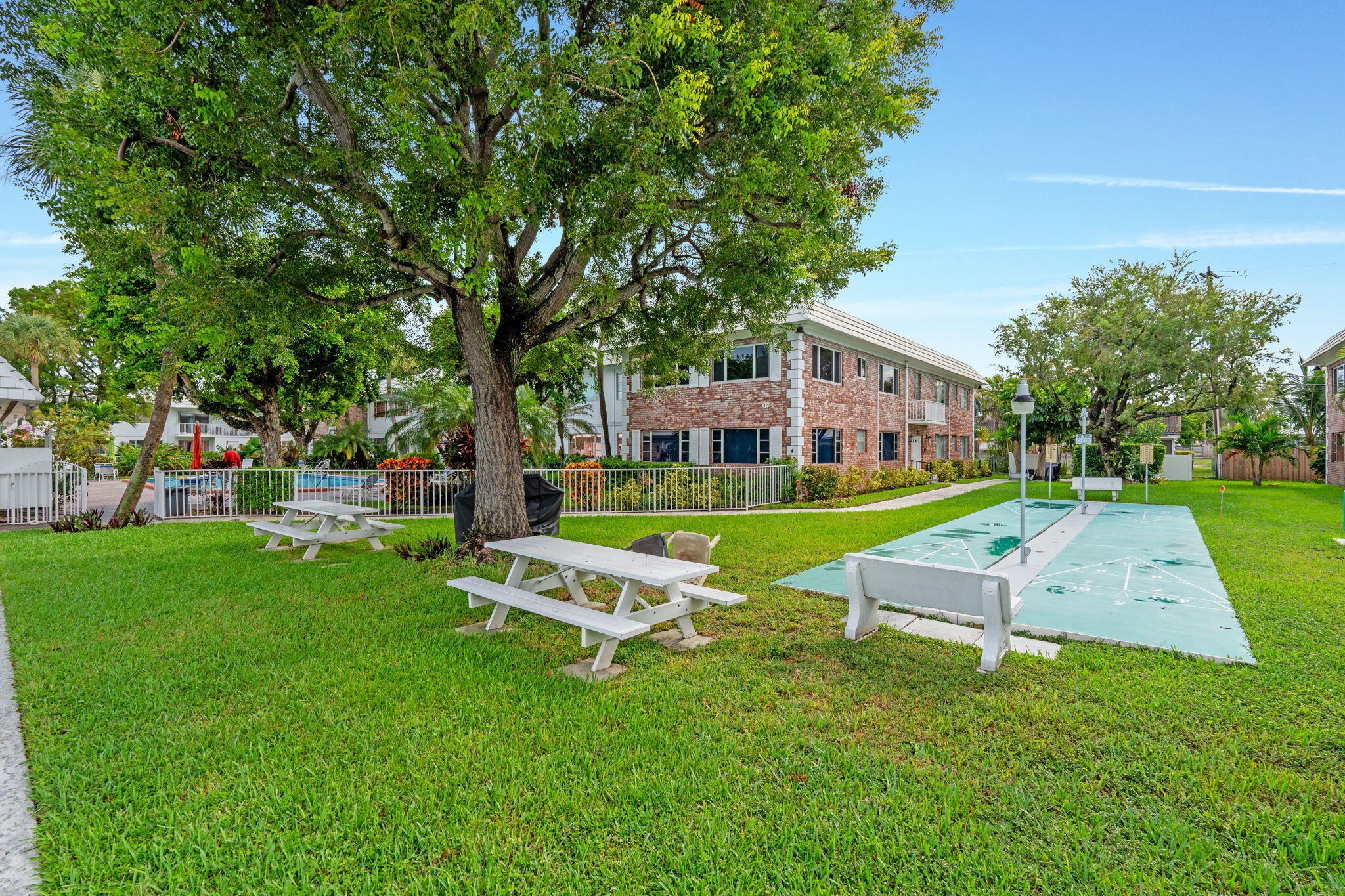 418 South Cypress Road, Unit 128 Pompano Beach, FL 33060 - Photo 42 of 49 a view of a house with a big yard