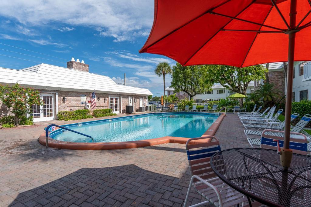418 South Cypress Road, Unit 128 Pompano Beach, FL 33060 - Photo 6 of 49 a view of swimming pool with a patio