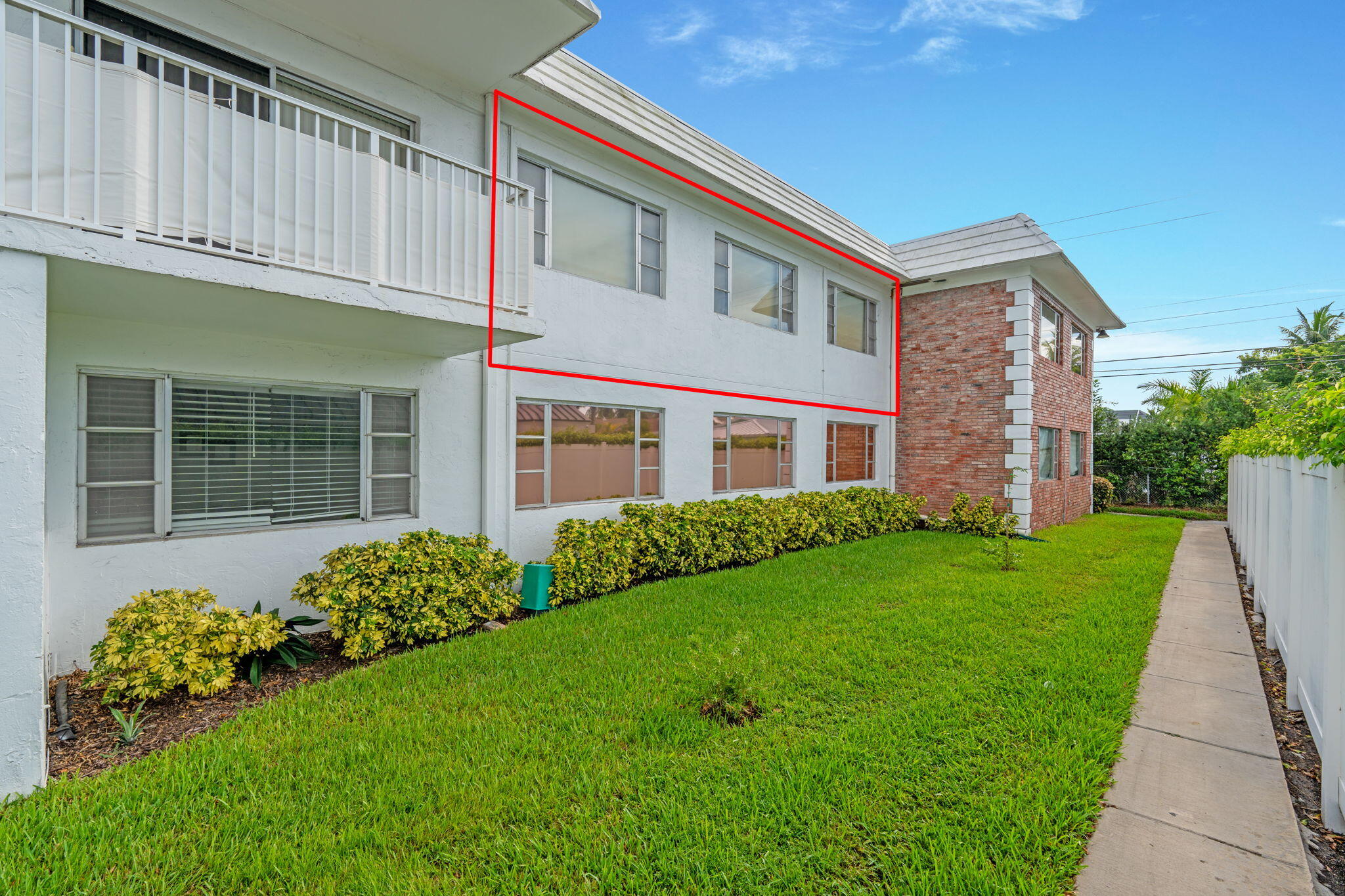 418 South Cypress Road, Unit 128 Pompano Beach, FL 33060 - Photo 7 of 49 a front view of a house with a garden