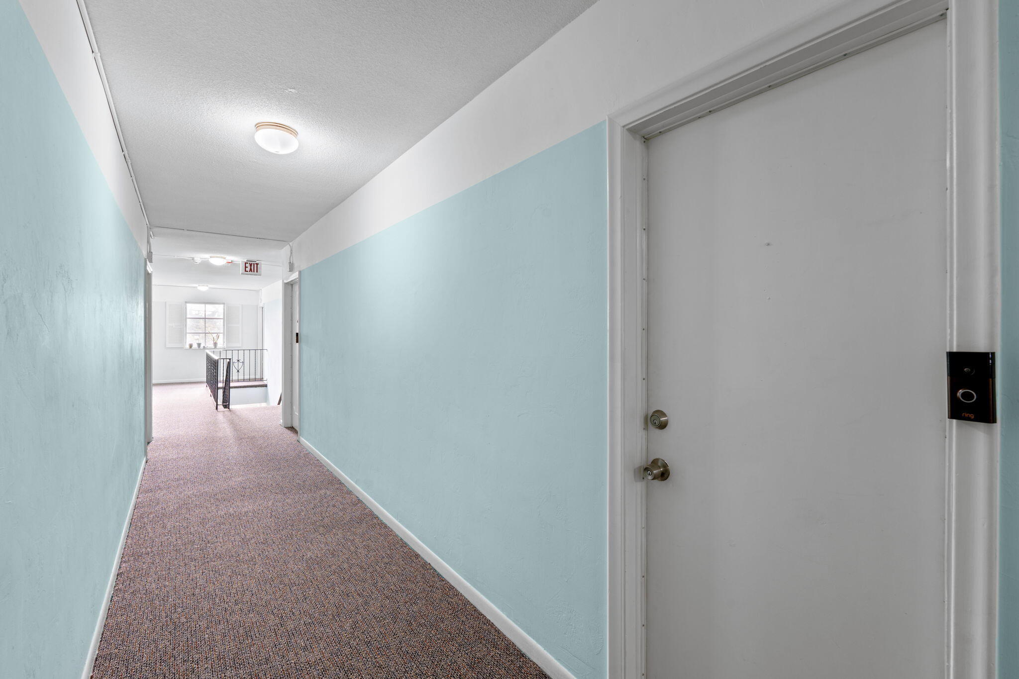 418 South Cypress Road, Unit 128 Pompano Beach, FL 33060 - Photo 9 of 49 a view of hallway with a bathroom