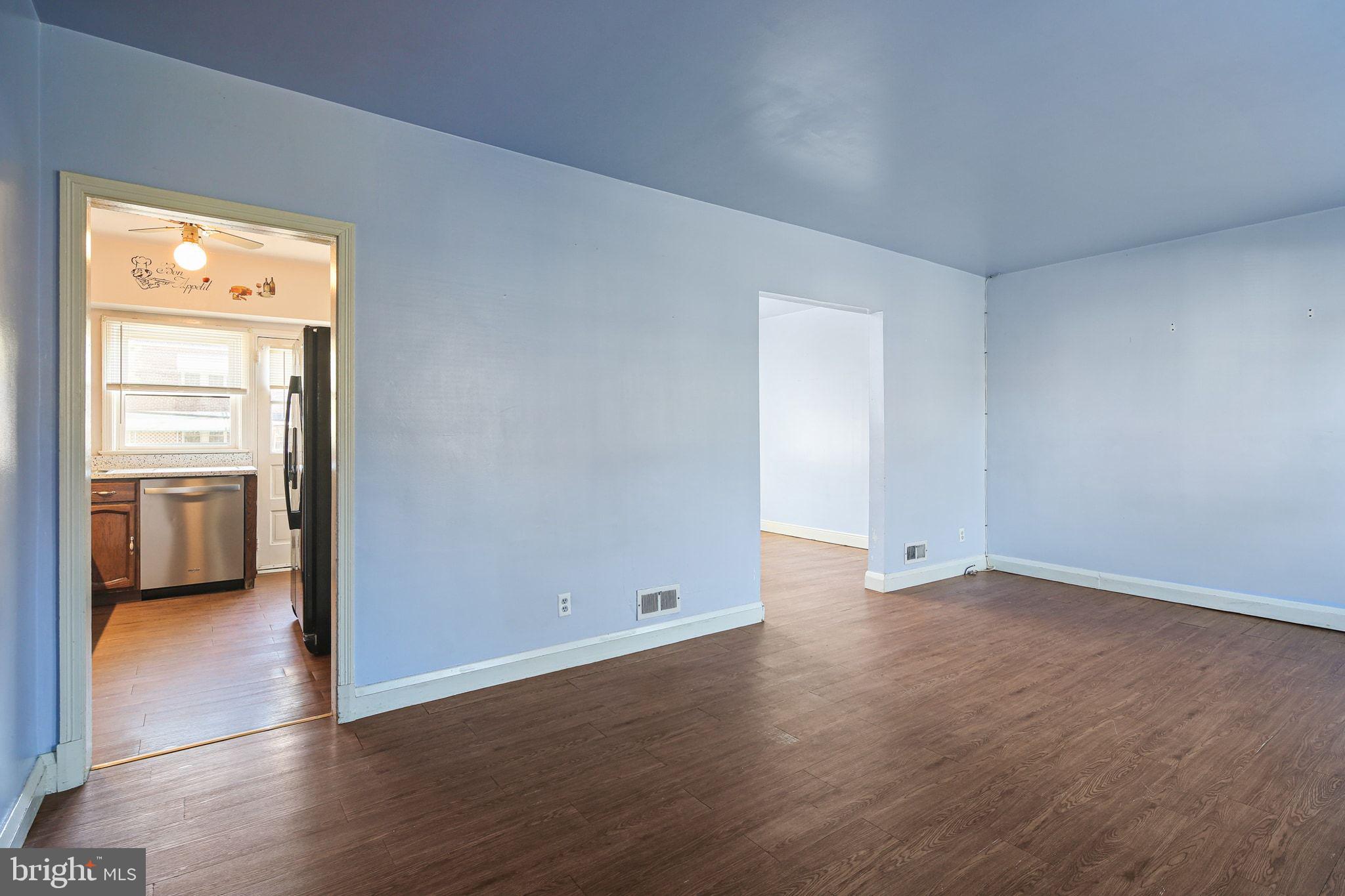 49 Briarwood Road Baltimore, MD 21228 - Photo 5 of 17 wooden floor in a empty room