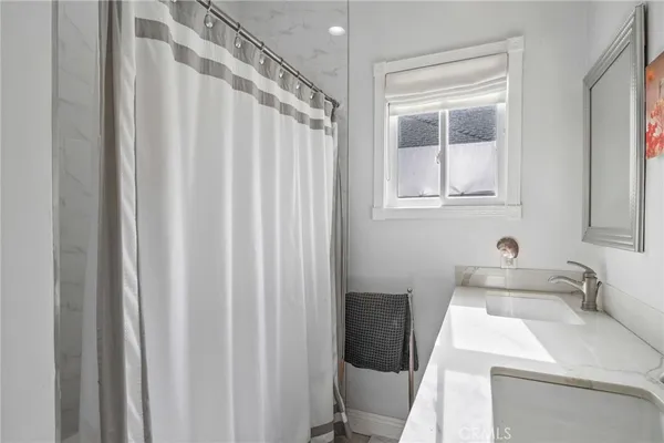 a bathroom with a sink and a toilet