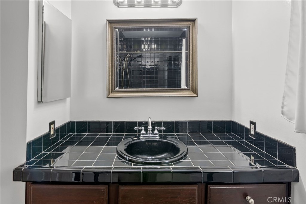 1007 Rose Avenue Pasadena, CA 91107 - Photo 43 of 52 a kitchen with a stove and a sink