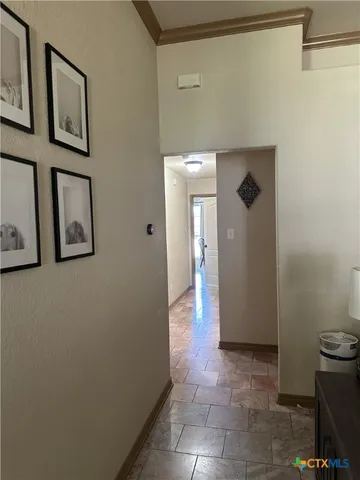 a kitchen with stainless steel appliances granite countertop a stove sink and cabinets