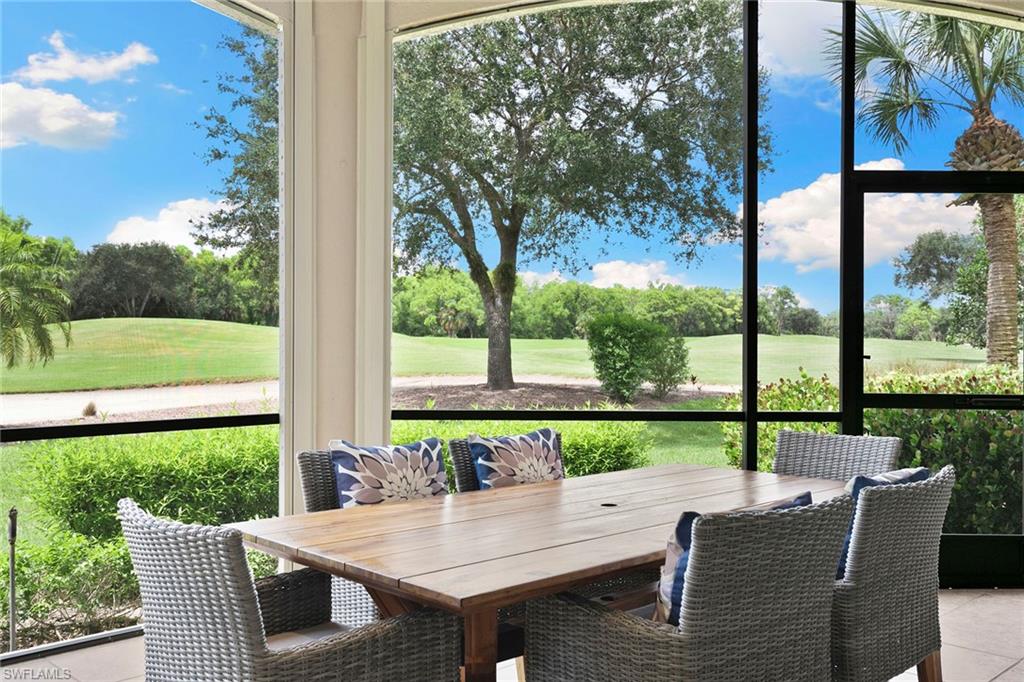 17005 Porta Vecchio Way, Unit 102 Naples, FL 34110 - Photo 32 of 50 a view of an outdoor space with seating