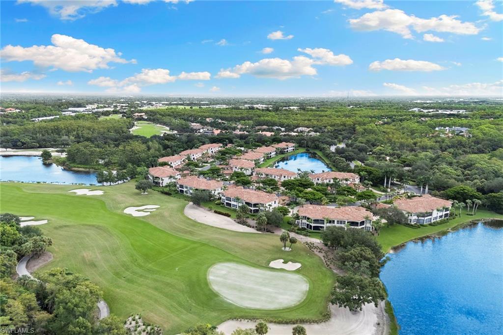 17005 Porta Vecchio Way, Unit 102 Naples, FL 34110 - Photo 39 of 50 an aerial view of residential houses with outdoor space