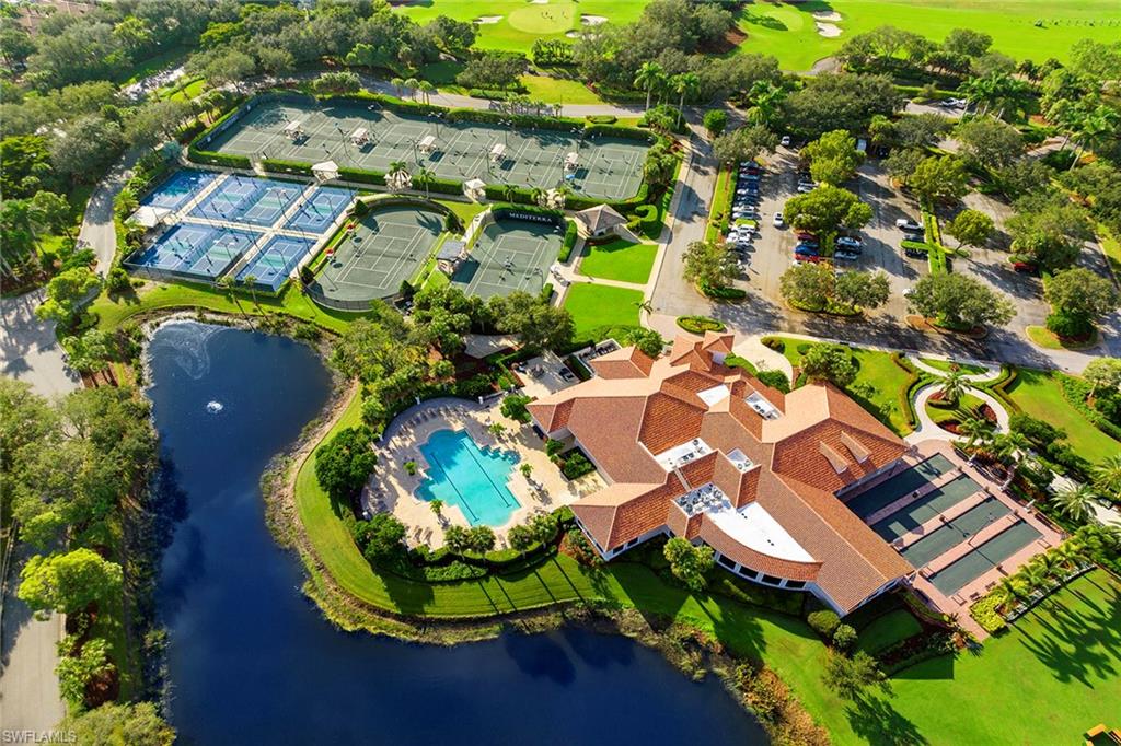 17005 Porta Vecchio Way, Unit 102 Naples, FL 34110 - Photo 44 of 50 an aerial view of a house with yard swimming pool and outdoor seating