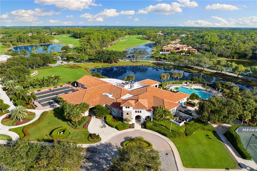 17005 Porta Vecchio Way, Unit 102 Naples, FL 34110 - Photo 48 of 50 an aerial view of a house with a garden