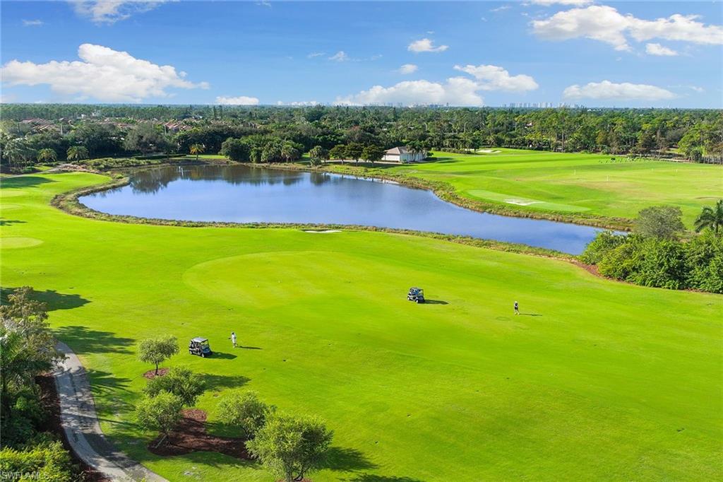 17005 Porta Vecchio Way, Unit 102 Naples, FL 34110 - Photo 50 of 50 a view of an outdoor space pool patio and outdoor seating